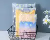 Wholesale in stock, universal printed Daisy zipper bags, simple frosted bags, semi-transparent and customizable undefined